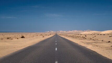 A long, dust-covered road leads into the distance of a vast desert. The sky is clear and blue, and the expansive scenery symbolizes adventurous journeys and exploration.