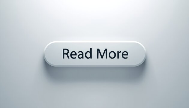 A sleek white button with the words 'Read More' on a light gray background