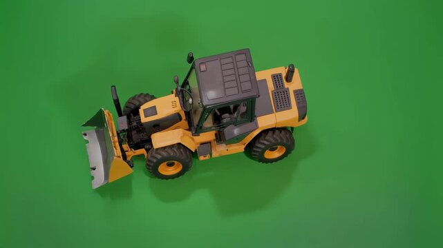 tractor with front loader on green screen background