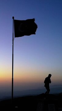 Vertical Video of Turkish Flag Waving at Sunrise with Atat&uuml;rk Statue on Kocatepe
