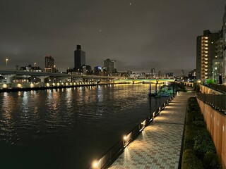 Fototapeta premium Urban Riverside Walkway at Night
