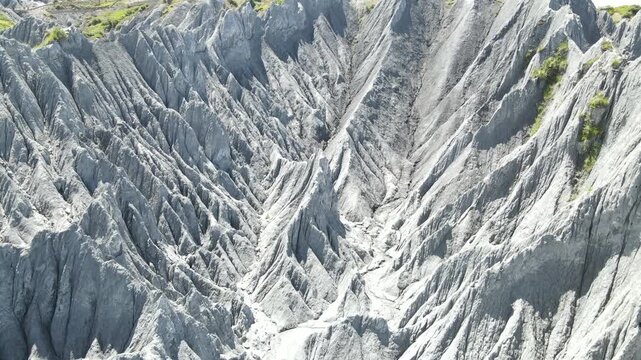 Aerial Forward Flight Over Dramatic Stone Forest Terrain in Moshi Park China
