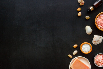 Fototapeta na wymiar Set of body care cosmetics products with essential oil scrubs and sea salt, top view. Aromatherapy spa products