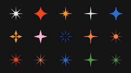 Obraz premium Assorted colorful starbursts and sparkles against a dark background