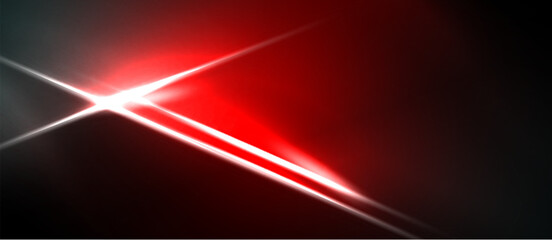 Fototapeta premium Abstract red light streaks cross dark background. Bright energy radiates from central intersection. Dynamic composition creates visual impact.