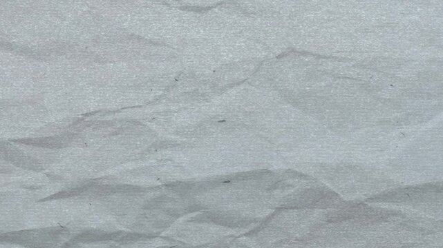 4K resolution background of paper texture background. Crumpled paper abstract shape background with animation.