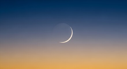 Obraz premium Crescent Moon in a Gradient Sky at Dusk, Thin Silver Crescent Moon, Celestial Body, Space Photography, Astronomy and Science