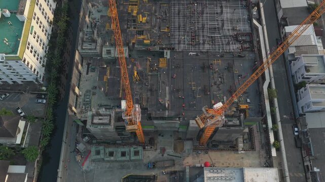 Aerial view of a Ai data center construction site with tower cranes, Thailand