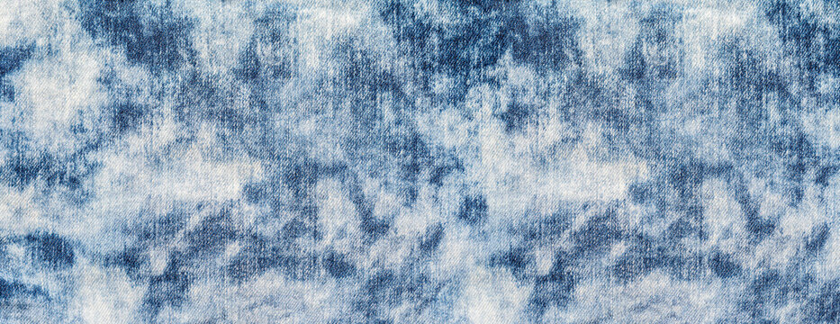 Acid wash denim fabric pattern with bleached blue texture