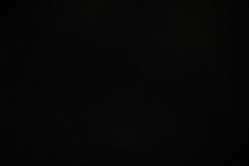 Obraz premium Abstract Black Dust Texture, Dark Particle Background, Subtle Grain Pattern, Minimalist Grunge Wallpaper, Creative Noise Design, Cinematic Atmosphere Backdrop