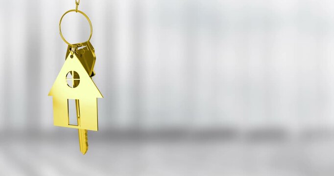Golden house keychain animation over blurred background
