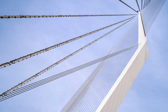 Harp-shaped bridge structure against sky. Futuristic building structures in Middle East, Israel, Chords Bridge, Jerusalem.