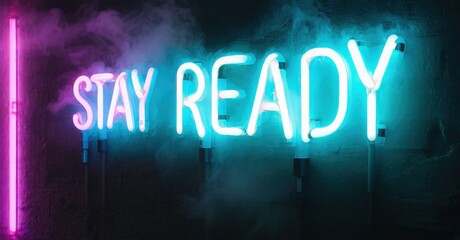 Fototapeta premium Bright neon sign displays Stay Ready. Blue, purple hues illuminate dark textured wall. Dramatic lighting creates moody atmosphere.