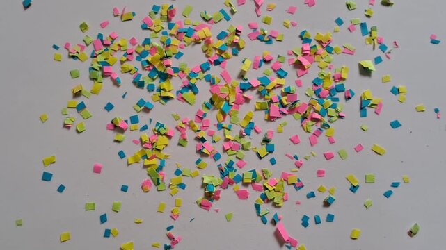 Colorful carnival confetti on a white background
