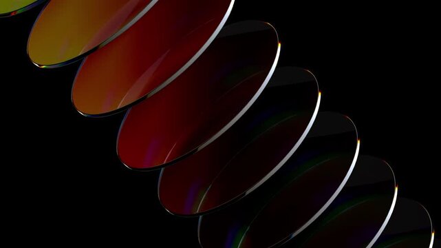 Loop 3d animation. Translucent glass blocks spin and rotate on black background, round lenses.