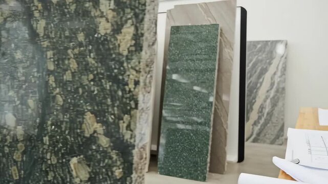 Professional inspecting ECO Granite greencertified tag on natural stone underscoring dedication to environmentally responsible material sourcing