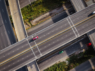 Aerial view city transport junction cross modern road morning light with vehicle movement