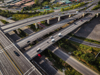 Aerial view city transport junction cross modern road morning light with vehicle movement