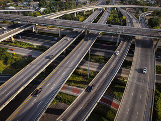 Aerial view city transport junction cross modern road morning light with vehicle movement