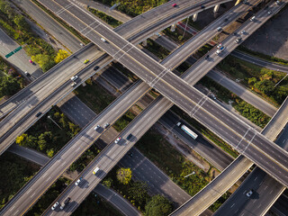 Aerial view city transport junction cross modern road morning light with vehicle movement
