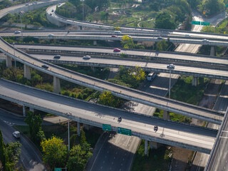 Aerial view city transport junction cross modern road morning light with vehicle movement