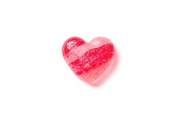 Obraz premium Single heart-shaped red and pink striped candy on a white surface