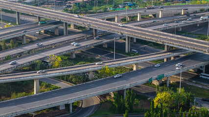 Aerial view city transport junction cross modern road morning light with vehicle movement