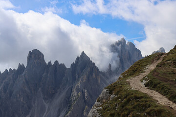 Mountain edge trail view toward Cadini di Misurina peaks
