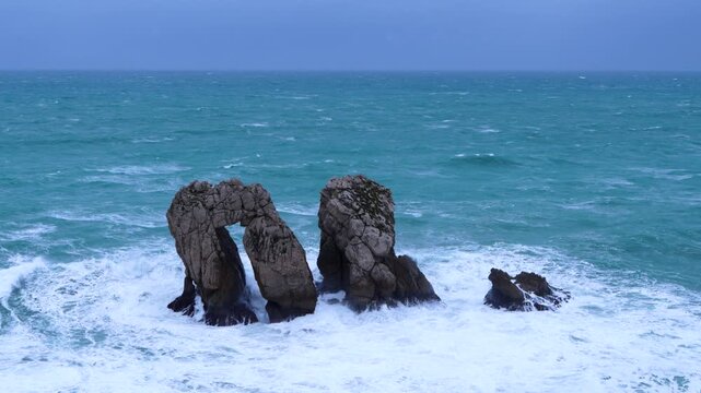 Storm and waves at "Urro del Manzano," also known as "Gateway to the Cantabrian Sea." Cantabrian Sea. Liencres Natural Park in the Costa Quebrada Geopark. Liencres, Cantabria, Spain, Europe