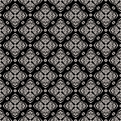 Classic seamless damask pattern in black and white with elegant floral ornaments. Timeless luxury style ideal for wallpaper, textile, fabric, interior decor, and vintage surface design.