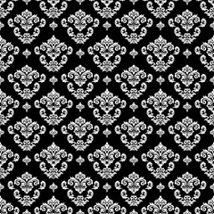 Classic seamless damask pattern in black and white with elegant floral ornaments. Timeless luxury style ideal for wallpaper, textile, fabric, interior decor, and vintage surface design.
