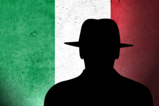 Italy spy and hackers launch cyber attacks. Hackers violate privacy. Hacker is searching  personal data. Social media data breaches