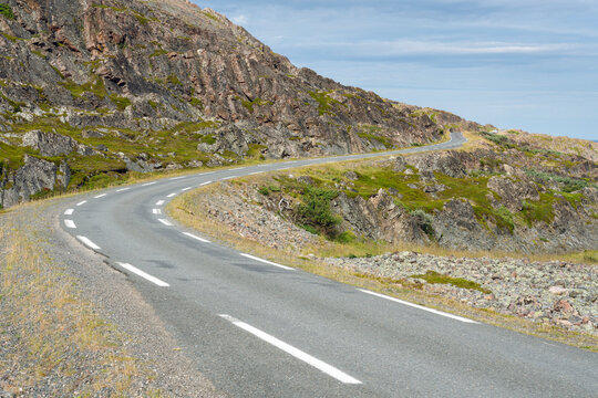 Winding road. The road to Hamningberg in Varanger, Northern Norway