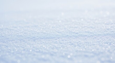 Obraz premium Close-up view of pristine, shimmering snow surface on a bright, sunny day