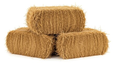 Three rectangular hay bales, stacked in a triangular formation, against white