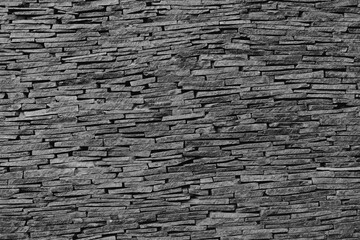 Obraz premium Monochrome Stacked Stone Cladding Wall Texture Detailed Architectural Background