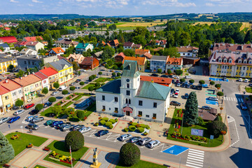 Aerial view of old town center with historic Ratusz Town Hall at Rynek market square of Sedziszow Malopolski town in Podkarpacie region of Lesser Poland © Art Media Factory
