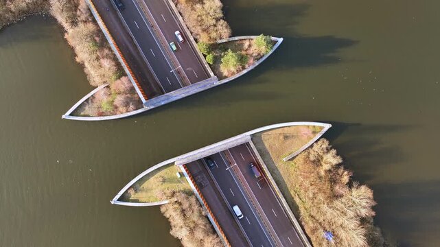 Road passing beneath a lake aqueduct