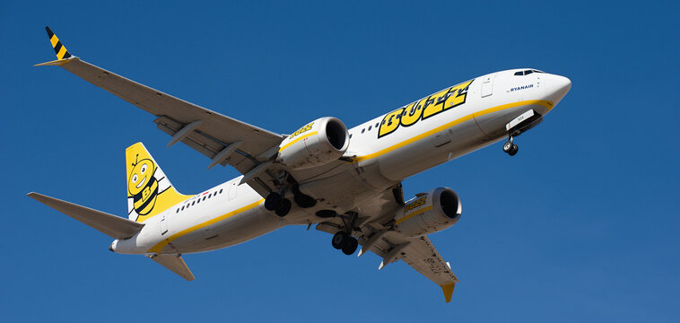 Tenerife, Spain january 30st, 2026. Boeing 737 MAX 8-200 Buzz Airlines flies in the blue sky. Landing at Tenerife Airport