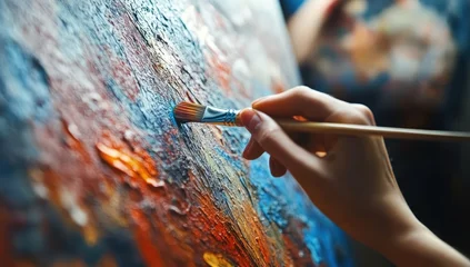 Gordijnen Abstracte kunst A hand holds a paintbrush, applying vibrant colors to a textured canvas, creating an abstract art piece.  © future7