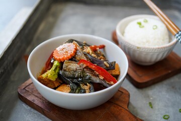 Thai Eggplant Curry served with Jasmine rice, selective focus