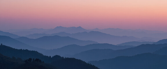 Fototapeta premium Breathtaking sunrise over mountain ranges nature landscape panoramic view tranquil environment