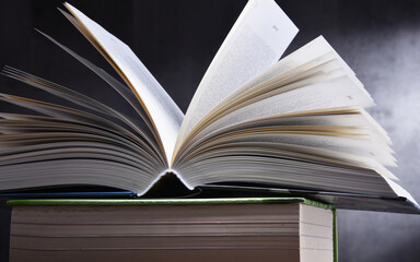 Composition with open book on the table