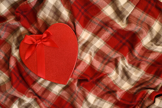 red heart on a red fabric