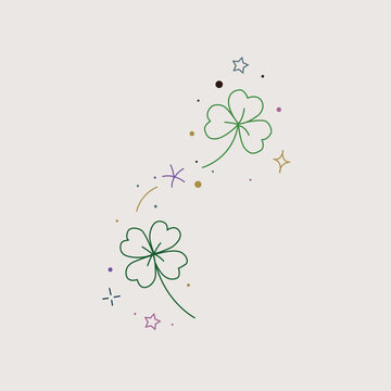 Hand drawn four leaf clover with magical sparkles and stars