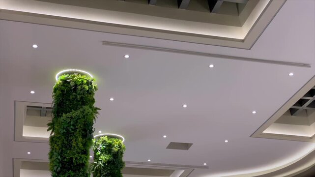 Contemporary ceiling structure with LED lights.