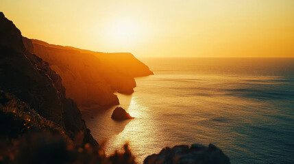 Sunset coastline cliff ocean Portugal, golden light over Atlantic seascape at dusk