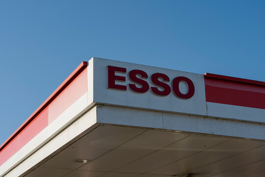 January 24, 2026, Middelburg, Netherlands - ESSO logo on a gas station canopy against a clear blue sky