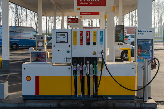 January 24, 2026, Amsterdam, Netherlands - Shell gas station fuel pump with various fuel options and promotional signs