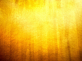Golden texture background with shiny metallic foil surface glinting yellow light luxury elegant abstract backdrop for holiday celebration design